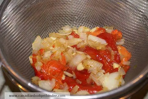 straining-peppers-and-onions