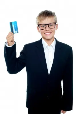 a boy holding credit card