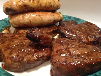 beef-tenderloin-steaks-homemade-sausages-and-salmon