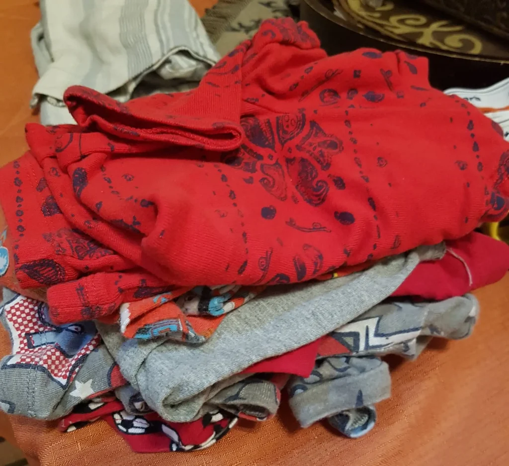 folded children's clothes for sale