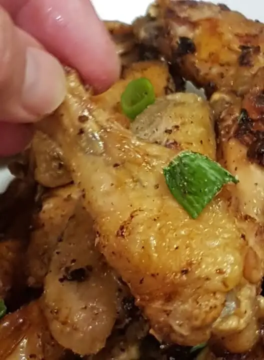 holding-a-keto-crispy-baked-chicken-wing