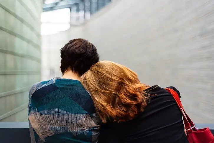 personal-financial-turmoil-couple-leaning-on-each-other