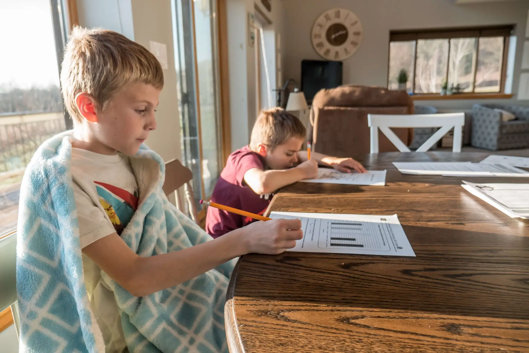 Frugal-family-time-kids-at-the-table-scaled