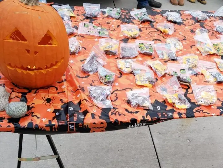 Hand Out Candy For Halloween On A Table At The End of The Driveway
