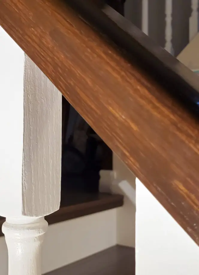 Sanded and stained stairs and spindles painted white
