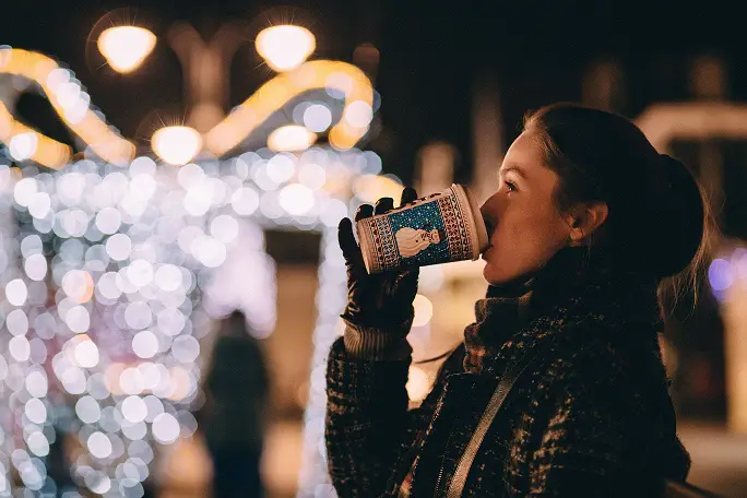After Christmas Sales Shopping and a Woman Drinking a Coffee