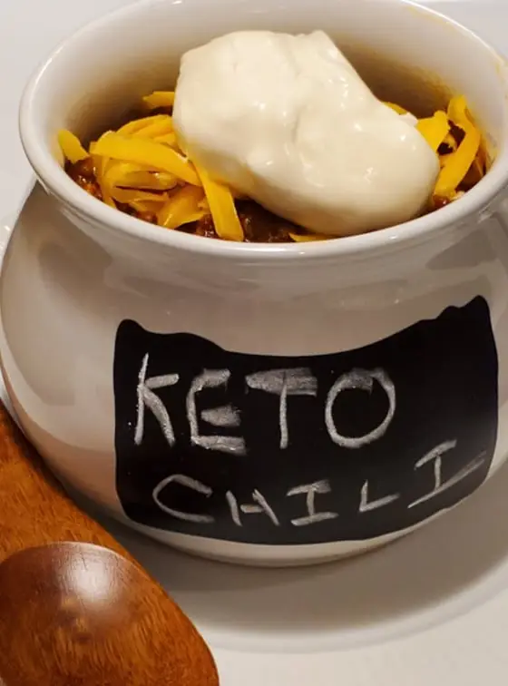 Homemade Keto Chili With Shredded Old Cheddar and Sourcream Toppings
