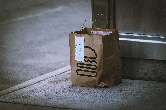 Food delivery service dropped off at your door after ordering online or from the telephone.