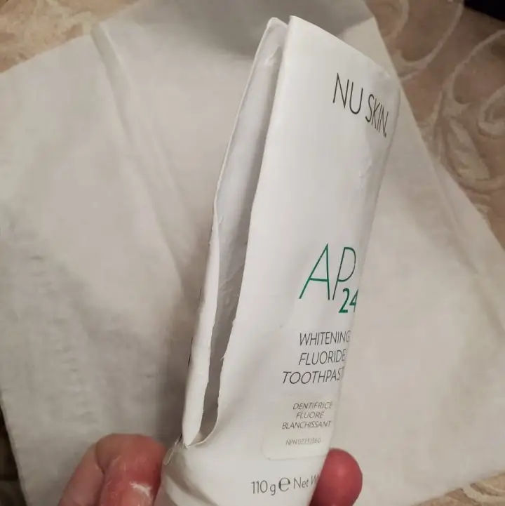 Cutting Open a tube of AP24 Whitening Fluoride Toothpaste