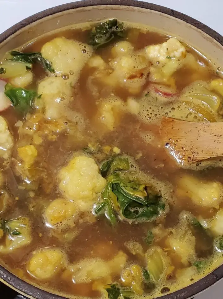 Bowl Of Italian Wedding Soup with mini meatballs. Keto recipe and traditional recipe