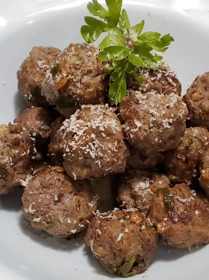 Italian mini meatballs fried in extra virgin olive oil and topped with Italian Parmigiano Reggiano Cheese.