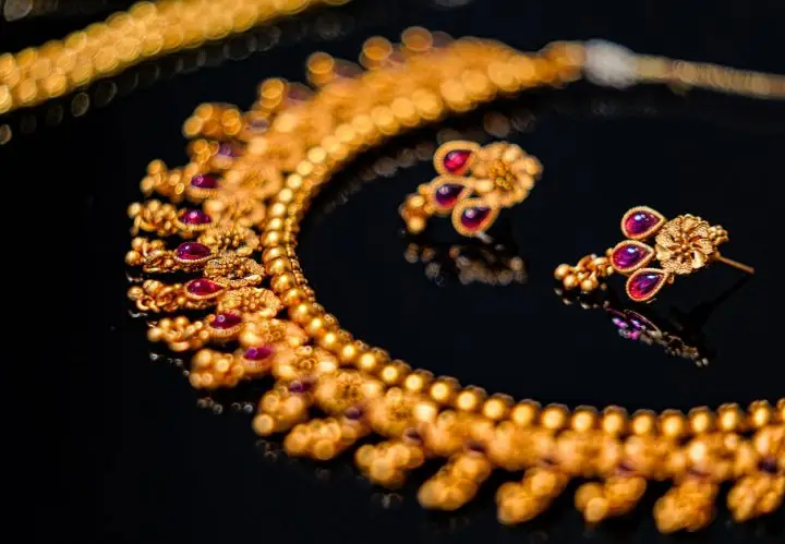 Gold necklace and earrings