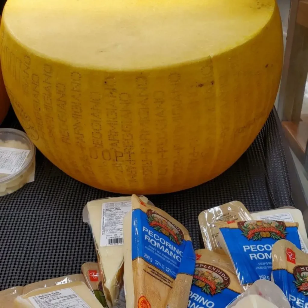 Reggiano Parmigiano Cheese Wheel with Romano Cheese Wedges