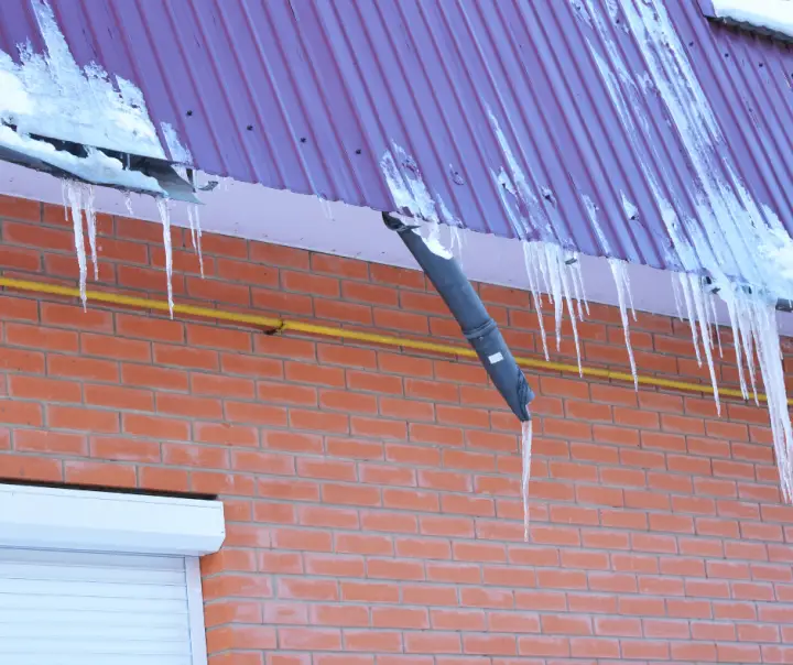 Ice Build Up In The Winter On The Gutters