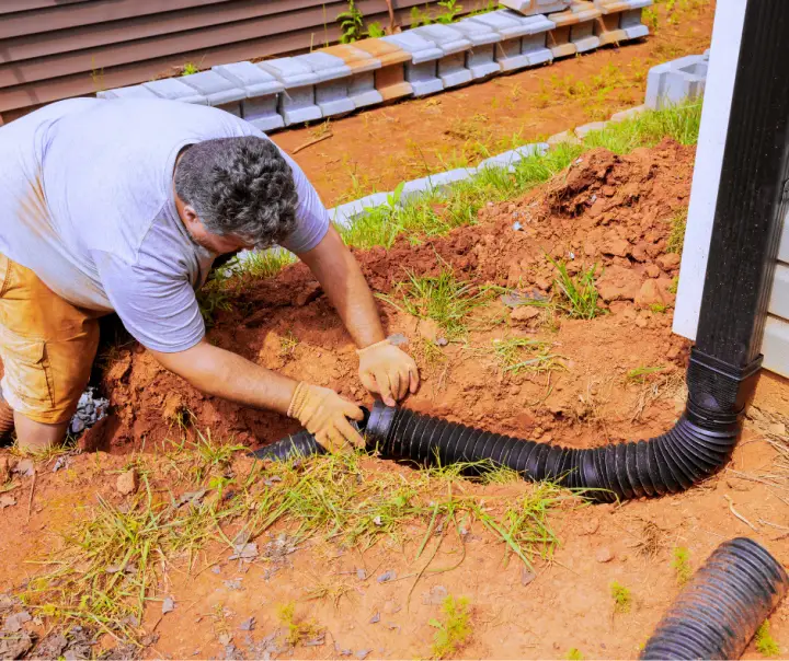 Protecting Property By Allowing The Water From The Gutters and Downspouts To Flow Away From The House