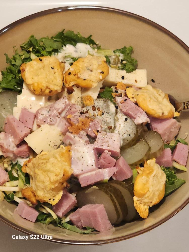 High Protein Cheesy Chickpea Crackers On A Salad