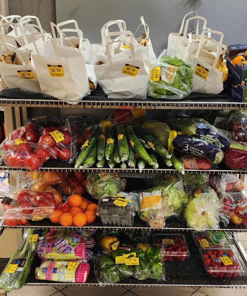 Reduced Rack at Zehrs with Yellow and Red Bananas plus loads of other produce.